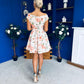 Betty Asymmetric Neckline Skater Mini Dress Peach