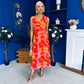 Robyn Pleated Midi Dress Marble Coral